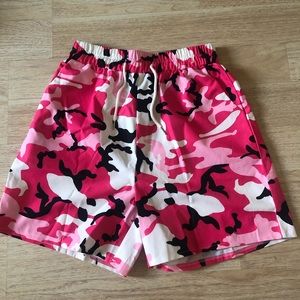 Pink Shein camo shorts.